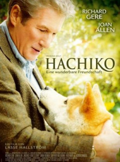 Hund und Besitzer schauen sich an